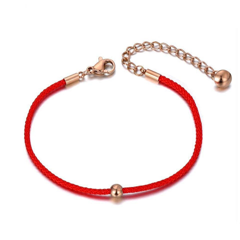 Červený náramek s kuličkou
